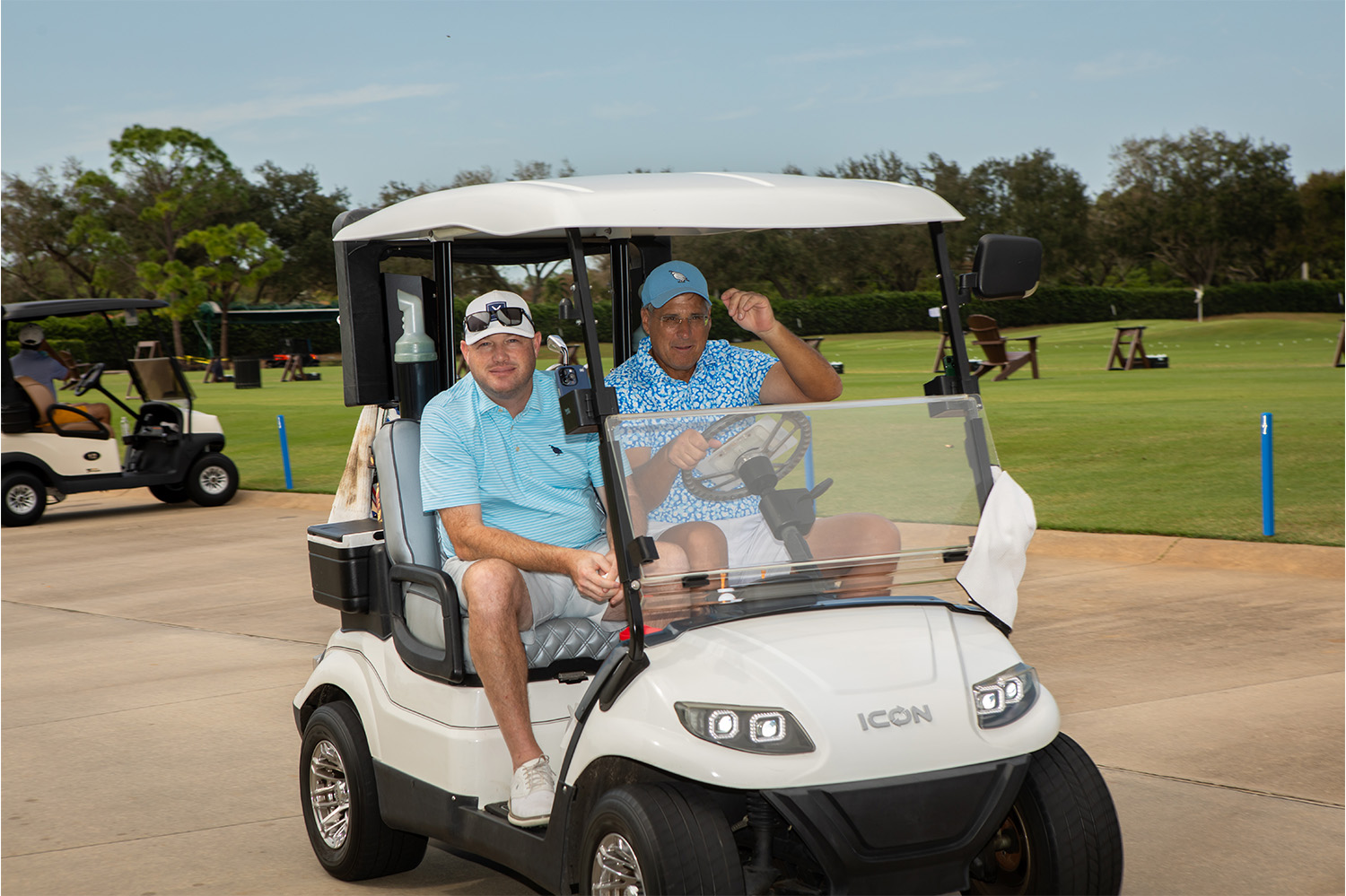 Golfers-on-golf-cart-2