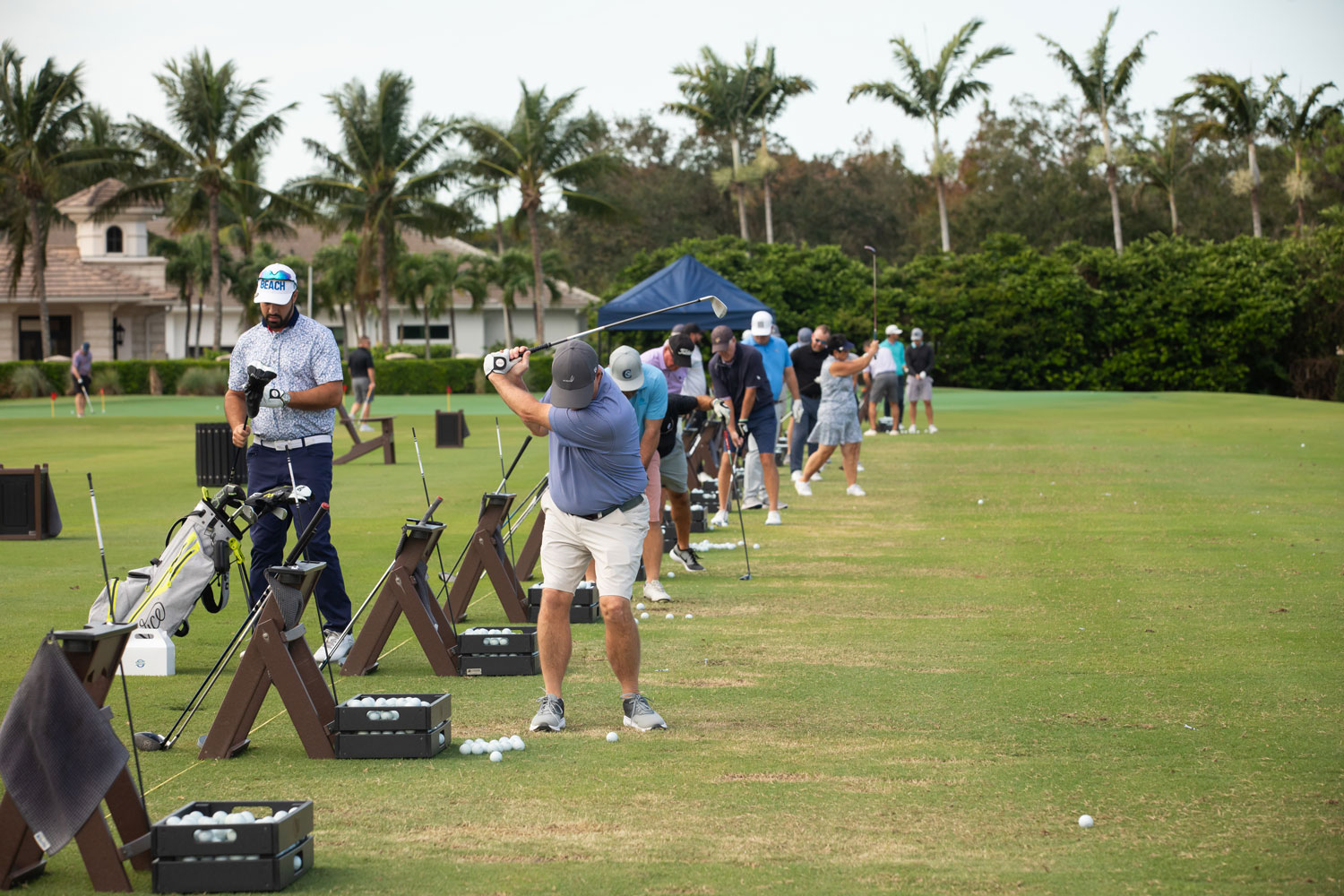 Participants prepare for the Third Annual Building Dreams Foundation golf scramble. Held last October at Quail West Golf & Country Club, the event raised $130,000 for local charitable organizations.